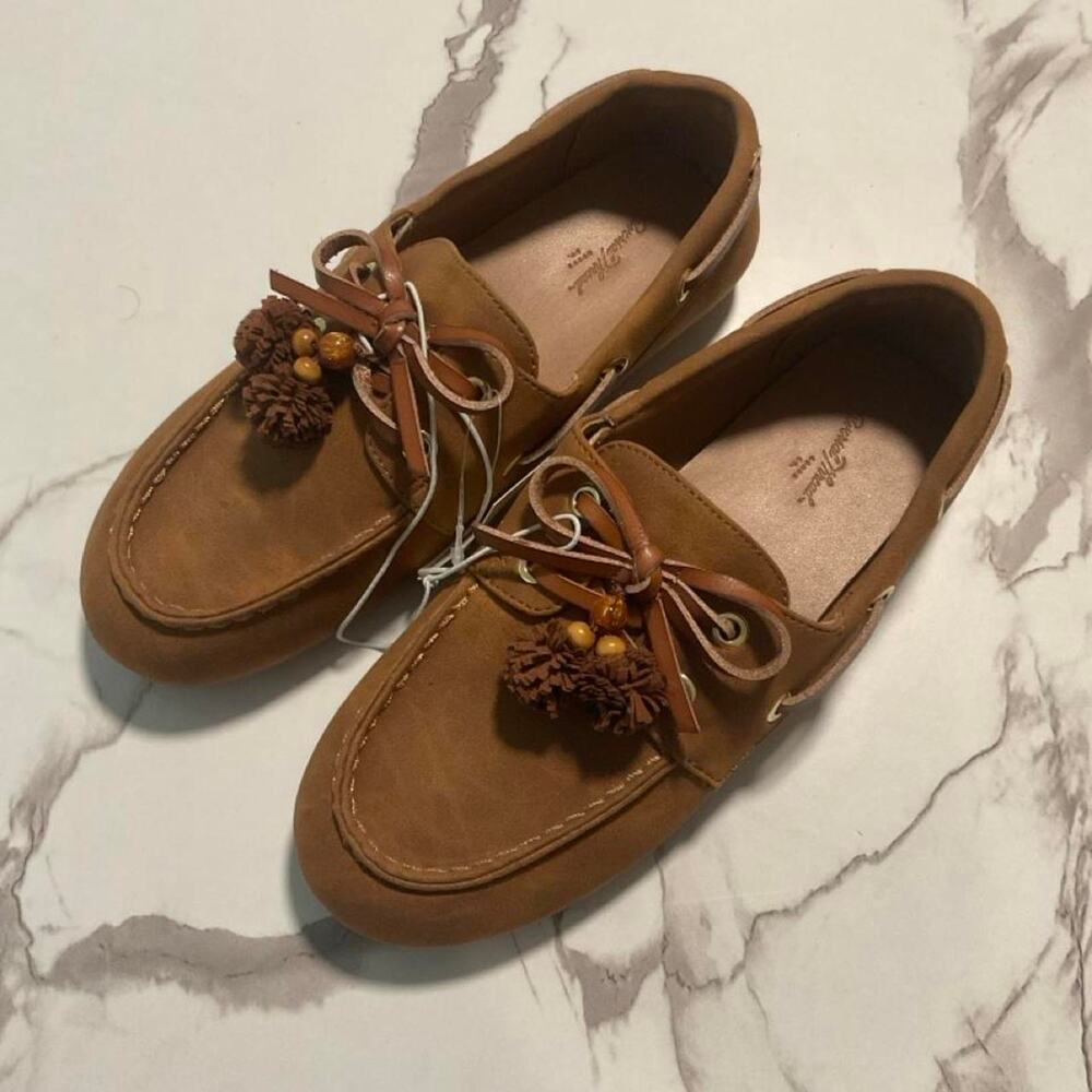 Brown suede loafers with tassel